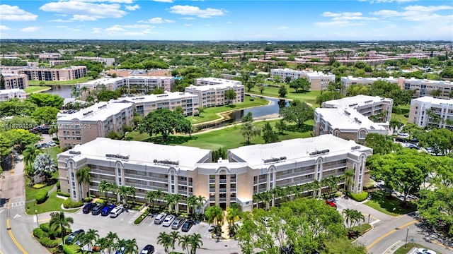 10217 NW 24th Pl Unit 310, Sunrise, FL 33322 - drone / aerial view of apartment complex and a nearby body of water
