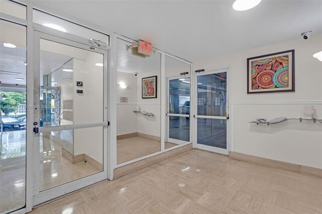 1345 Lincoln Rd Unit 1005, Miami Beach, FL 33139 - bathroom featuring french doors and baseboards