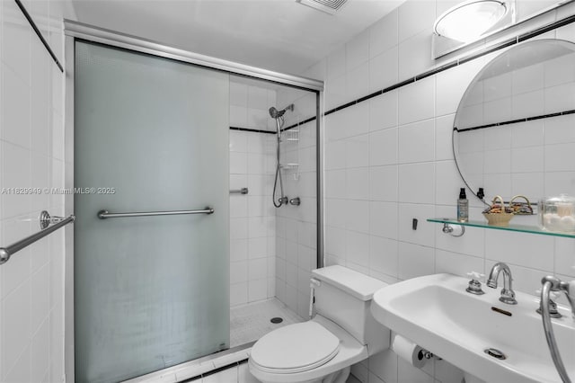 1345 Lincoln Rd Unit 1005, Miami Beach, FL 33139 - bathroom with tile walls and a stall shower