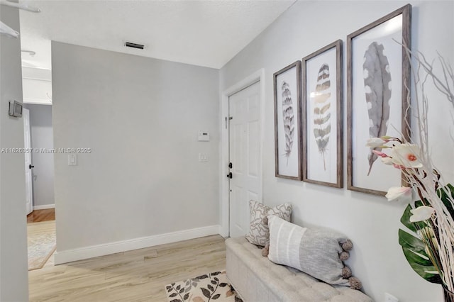 13552 NW 5th Ct, Plantation, FL 33325 - foyer featuring wood finished floors and baseboards
