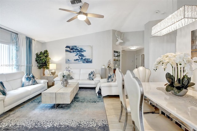 13552 NW 5th Ct, Plantation, FL 33325 - living room with light wood-style flooring, vaulted ceiling, and ceiling fan