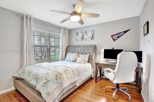 13552 NW 5th Ct, Plantation, FL 33325 - bedroom featuring wood finished floors, ceiling fan, and an office area