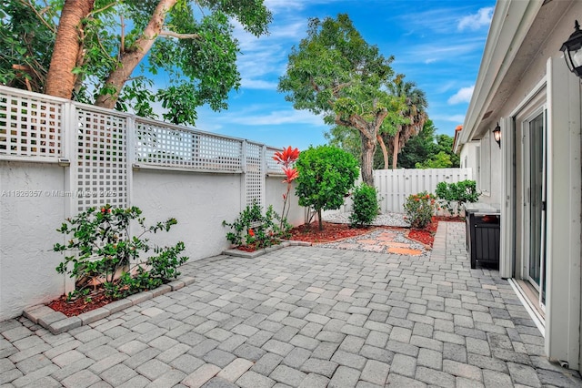 13552 NW 5th Ct, Plantation, FL 33325 - fenced backyard with a patio