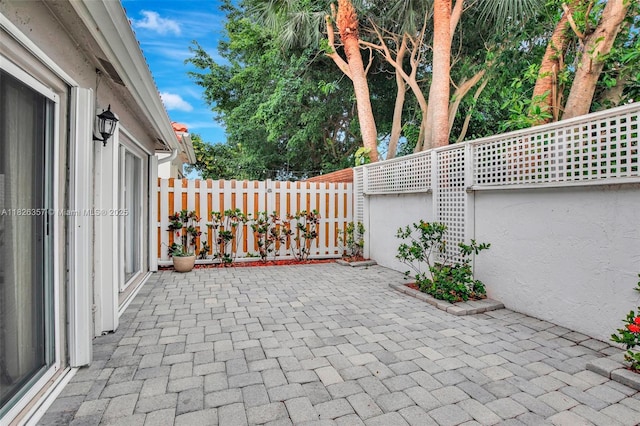 13552 NW 5th Ct, Plantation, FL 33325 - fenced backyard with a patio area
