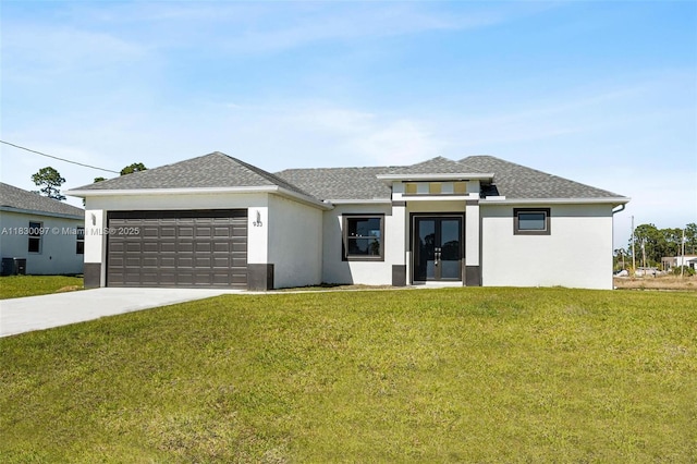 933 Gleason St, Lehigh Acres, FL 33974 - prairie-style home with french doors, a garage, stucco siding, and driveway