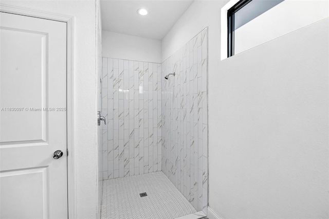 933 Gleason St, Lehigh Acres, FL 33974 - bathroom featuring a stall shower and recessed lighting