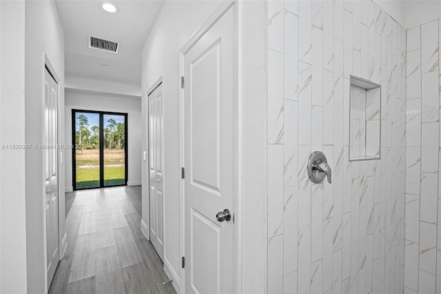 933 Gleason St, Lehigh Acres, FL 33974 - corridor featuring recessed lighting and wood finished floors