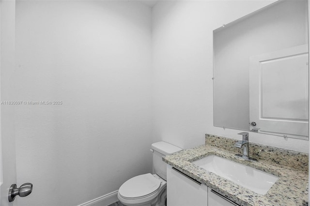 933 Gleason St, Lehigh Acres, FL 33974 - bathroom featuring vanity and toilet