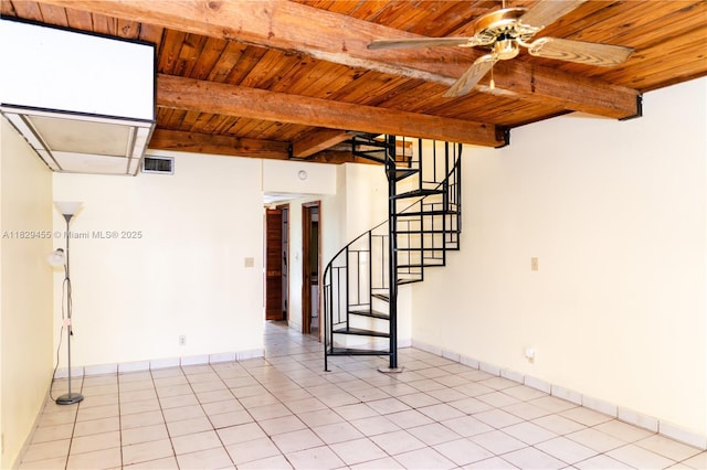 3719 Riverside Dr Unit 3719, Coral Springs, FL 33065 - empty room featuring a wood ceiling with exposed beams, a ceiling fan, light tile patterned floors, and stairs