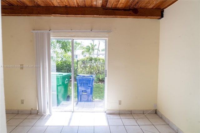 3719 Riverside Dr Unit 3719, Coral Springs, FL 33065 - unfurnished room with a wood ceiling with exposed beams and light tile patterned floors