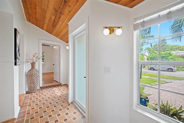 8325 NE 3rd Ave, Miami, FL 33138 - hallway featuring wooden ceiling, vaulted ceiling, and brick patterned flooring