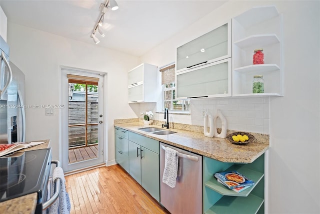 8325 NE 3rd Ave, Miami, FL 33138 - kitchen featuring open shelves, stainless steel dishwasher, light wood-type flooring, decorative backsplash, and range with electric cooktop