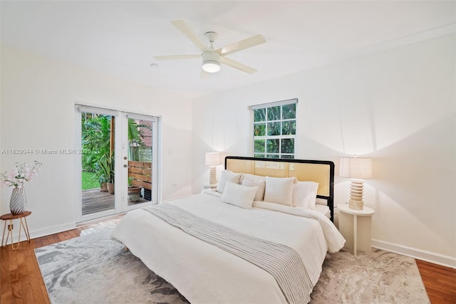 8325 NE 3rd Ave, Miami, FL 33138 - bedroom with access to exterior, wood finished floors, and a ceiling fan