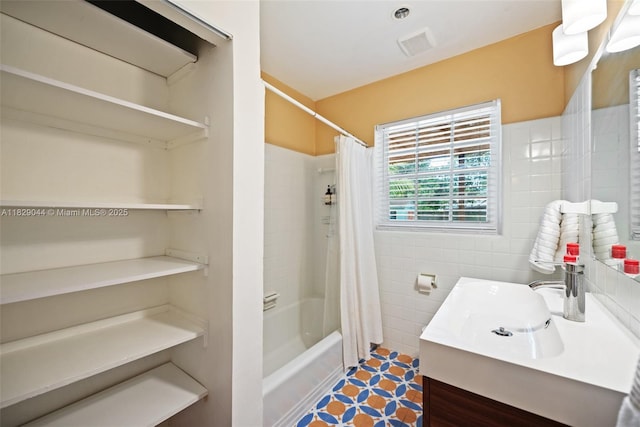 8325 NE 3rd Ave, Miami, FL 33138 - full bath featuring vanity, tile walls, shower / bath combo with shower curtain, and tile patterned flooring