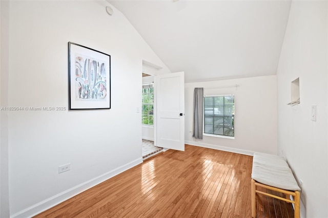 8325 NE 3rd Ave, Miami, FL 33138 - empty room featuring vaulted ceiling and hardwood / wood-style flooring