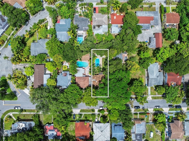 8325 NE 3rd Ave, Miami, FL 33138 - aerial view of property and surrounding area featuring property boundaries highlighted and nearby suburban area