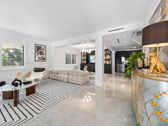 1117 Alberca St, Coral Gables, FL 33134 - living room featuring light marble finish flooring and a chandelier