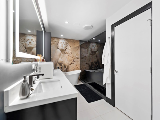 1117 Alberca St, Coral Gables, FL 33134 - full bath featuring double vanity, a freestanding bath, an accent wall, tile walls, and tile patterned floors
