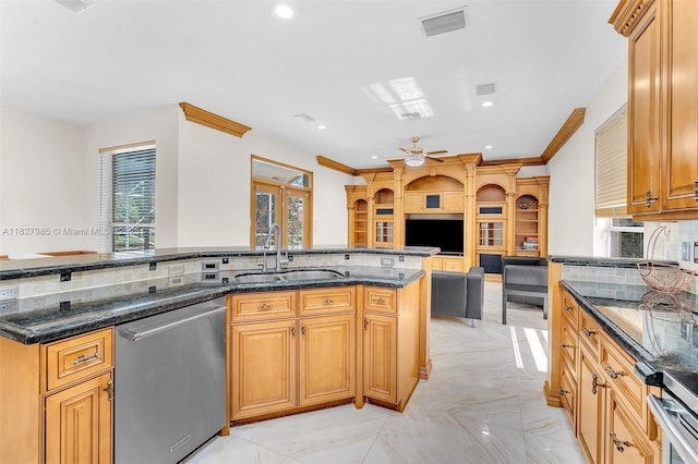 6201 Floridian Cir, Lake Worth, FL 33463 - kitchen featuring stainless steel appliances, light marble finish floors, tasteful backsplash, dark stone countertops, and ceiling fan