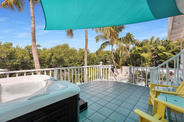 835 70th St, Gulf, Marathon, FL 33050 - view of patio with a hot tub and area for grilling