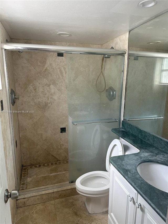 251 Galen Dr Unit 112E, Key Biscayne, FL 33149 - bathroom featuring vanity, a shower stall, and tile patterned flooring