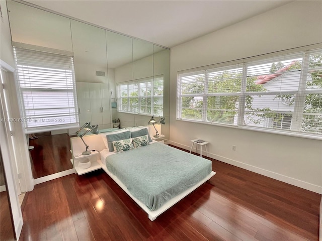 935 Euclid Ave Unit 7, Miami Beach, FL 33139 - bedroom with baseboards and wood finished floors