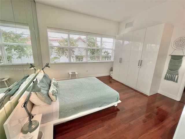 935 Euclid Ave Unit 7, Miami Beach, FL 33139 - bedroom featuring wood finished floors and baseboards