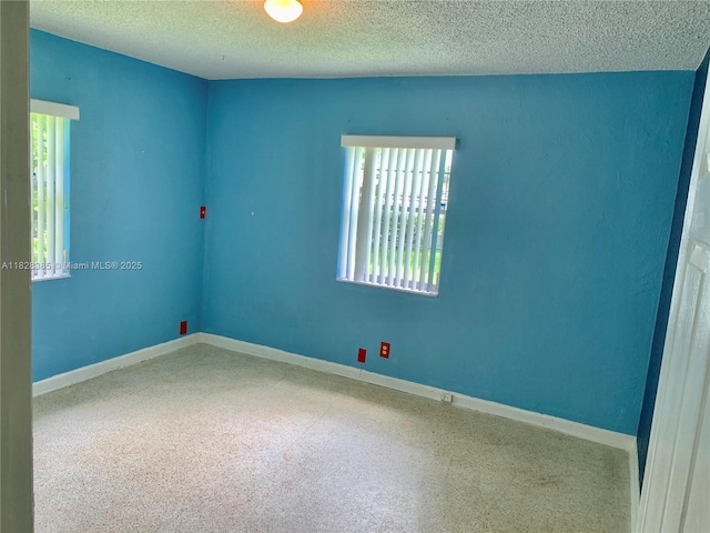 5221 Orange Dr, Davie, FL 33314 - unfurnished room featuring a textured ceiling and carpet flooring