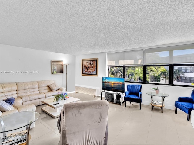 20401 NE 30th Ave Unit 310-8, Aventura, FL 33180 - living area featuring a textured ceiling and tile patterned floors