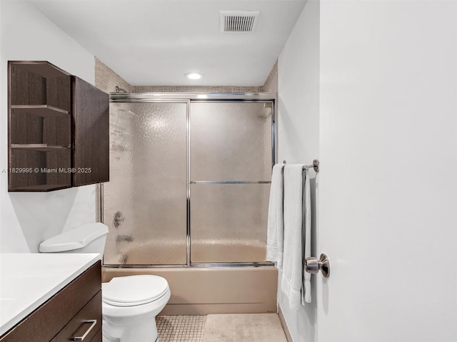 20401 NE 30th Ave Unit 310-8, Aventura, FL 33180 - bathroom featuring vanity, bath / shower combo with glass door, and tile patterned flooring
