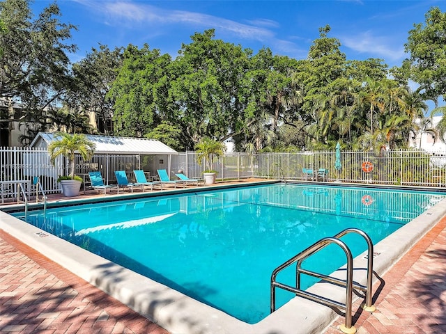 20401 NE 30th Ave Unit 310-8, Aventura, FL 33180 - community pool featuring view of scattered trees