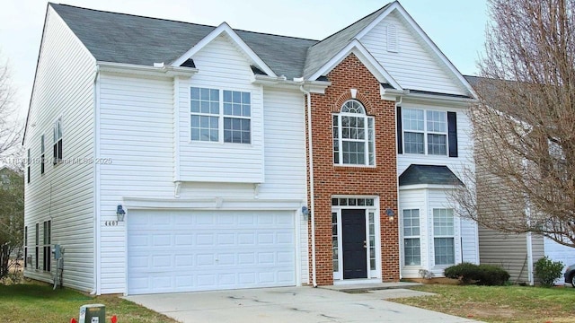 4407 Karlbrook Ln, ,, NC 27616 - traditional-style house with a garage, concrete driveway, and a shingled roof