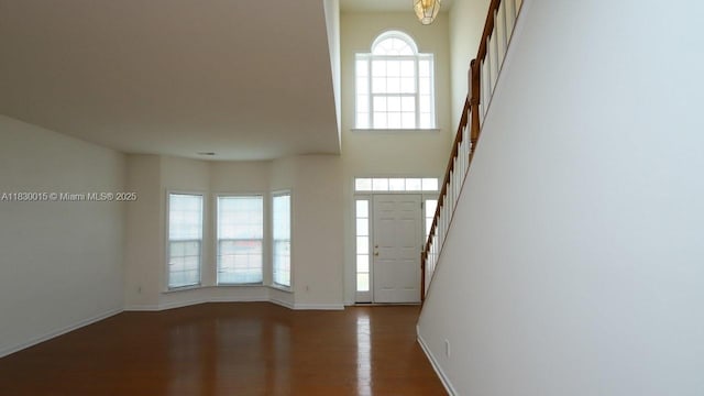4407 Karlbrook Ln, ,, NC 27616 - foyer entrance with stairway and wood finished floors