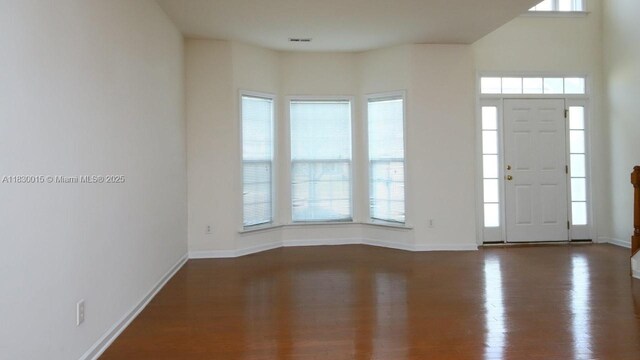 4407 Karlbrook Ln, ,, NC 27616 - entrance foyer featuring baseboards and wood finished floors