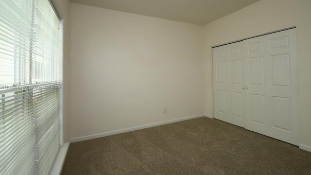 4407 Karlbrook Ln, ,, NC 27616 - unfurnished bedroom with carpet and a closet