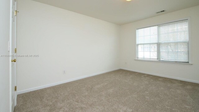 4407 Karlbrook Ln, ,, NC 27616 - carpeted empty room featuring baseboards