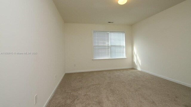 4407 Karlbrook Ln, ,, NC 27616 - carpeted empty room with baseboards