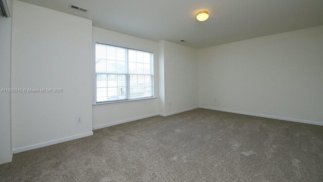 4407 Karlbrook Ln, ,, NC 27616 - empty room featuring carpet and baseboards
