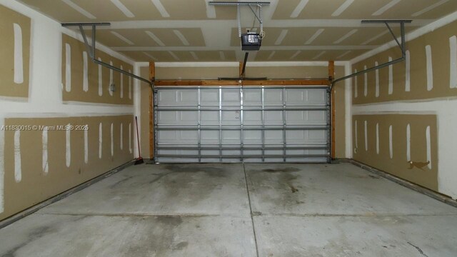 4407 Karlbrook Ln, ,, NC 27616 - garage featuring a garage door opener