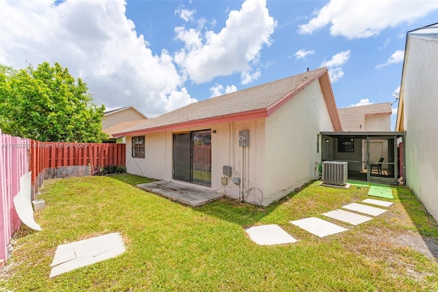 6908 SW 104th Ct, Miami, FL 33173 - back of house featuring a fenced backyard, a sunroom, and stucco siding
