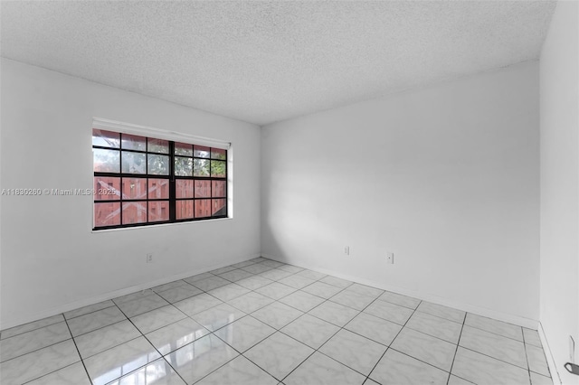 6908 SW 104th Ct, Miami, FL 33173 - unfurnished room with a textured ceiling