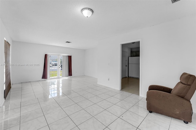 6908 SW 104th Ct, Miami, FL 33173 - empty room with light tile patterned flooring