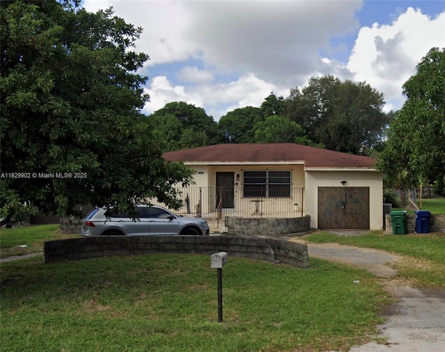 14430 N Miami Ave, Miami, FL 33168 - view of front facade with stucco siding, a front yard, and dirt driveway