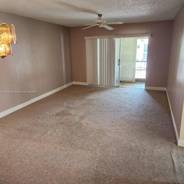 4163 NW 90th Ave Unit 206, Coral Springs, FL 33065 - spare room featuring ceiling fan, carpet floors, and a textured ceiling