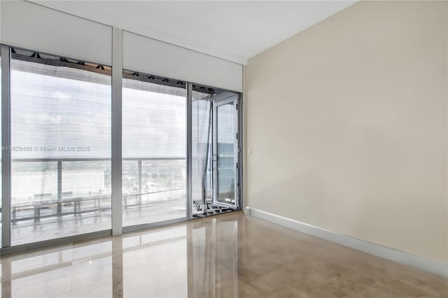 1425 Brickell Ave Unit 44A-B, Miami, FL 33131 - empty room with baseboards