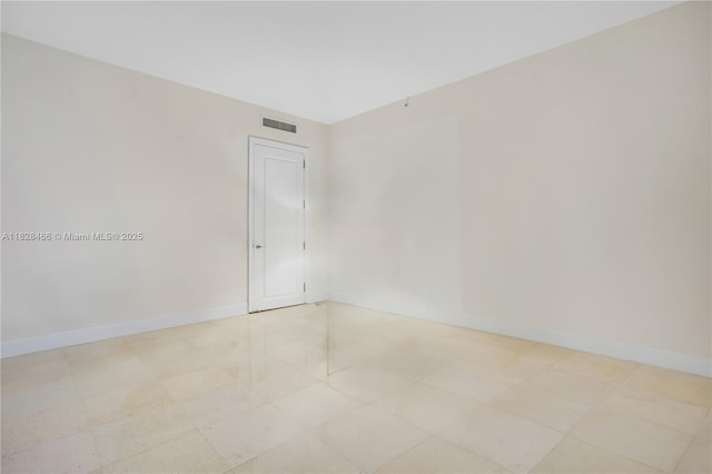 1425 Brickell Ave Unit 44A-B, Miami, FL 33131 - spare room with baseboards