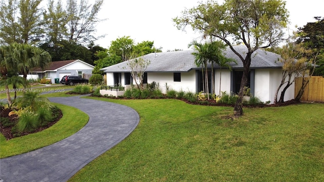 17902 SW 87th Pl, Palmetto Bay, FL 33157 - view of front of house featuring stucco siding and a shingled roof