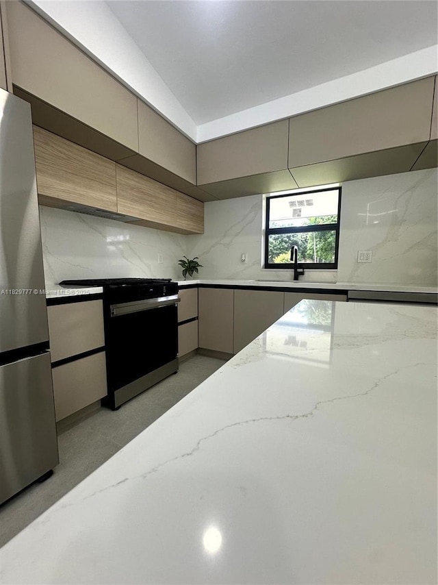 17902 SW 87th Pl, Palmetto Bay, FL 33157 - kitchen with freestanding refrigerator, light stone countertops, gray cabinets, modern cabinets, and tasteful backsplash
