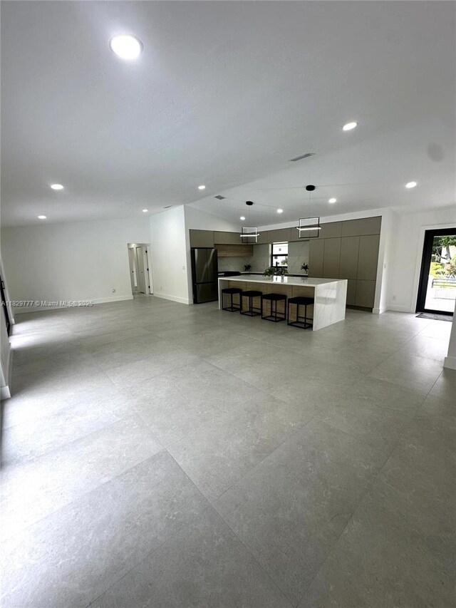 17902 SW 87th Pl, Palmetto Bay, FL 33157 - unfurnished living room with recessed lighting and baseboards