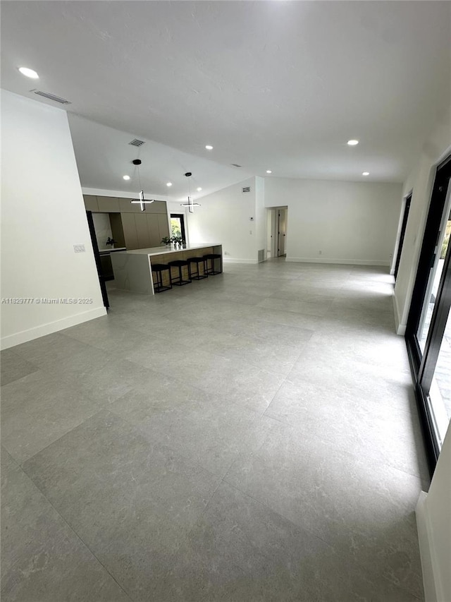 17902 SW 87th Pl, Palmetto Bay, FL 33157 - unfurnished living room featuring recessed lighting
